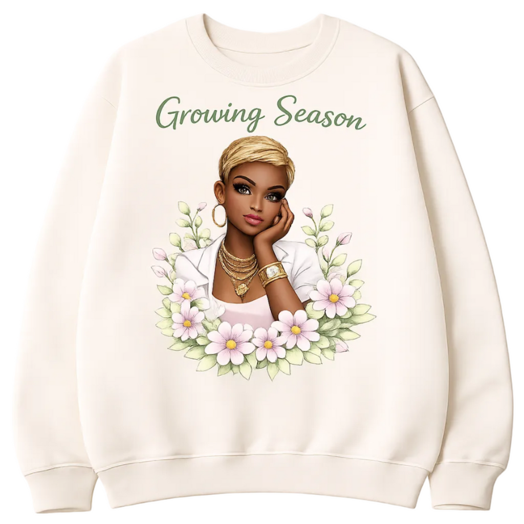 A statement of growth, purpose, and confidence. The “Growing Season” Sweatshirt features a bold, full-color graphic with soft floral elements and a powerful message