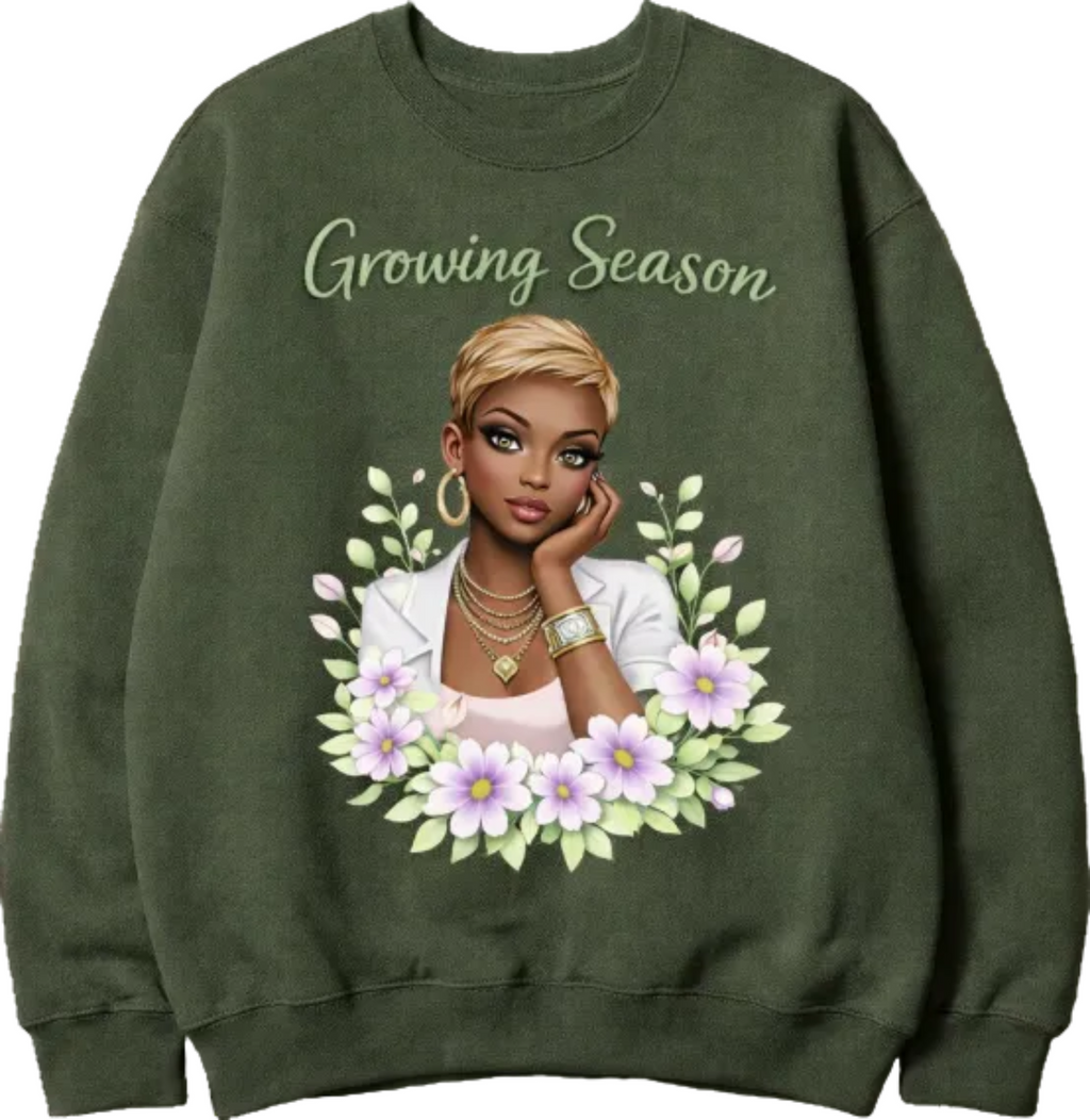 A statement of growth, purpose, and confidence. The “Growing Season” Sweatshirt features a bold, full-color graphic with soft floral elements and a powerful message